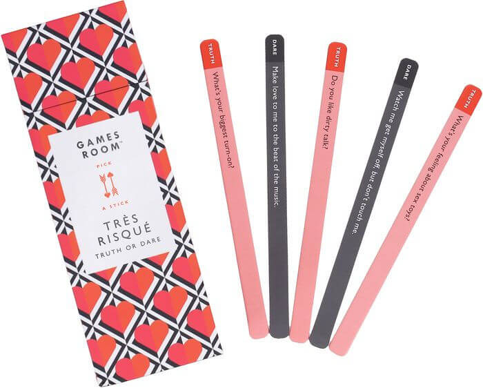 Tre Risque Truth Or Dare Game featuring conversation sticks for couples' party fun.