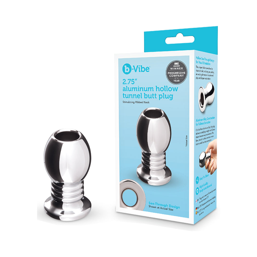 b-Vibe Essentials 2.75 Inch Aluminum Hollow Tunnel Butt Plug displayed with packaging.