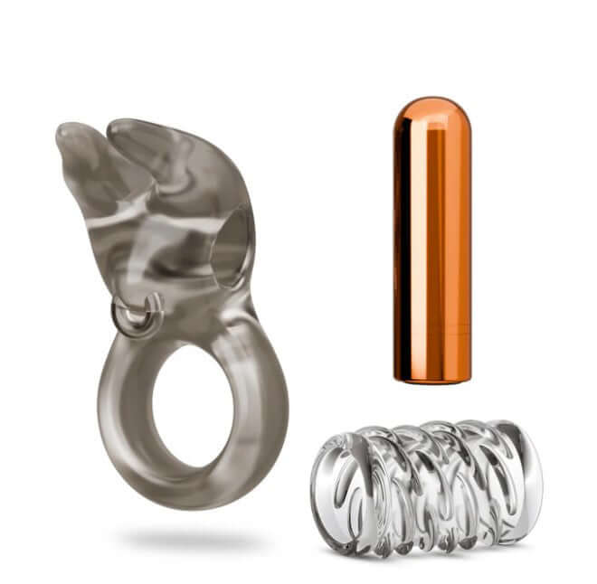Stay Hard Vibrating Cock Ring Set With Sleeve Sheath including cock ring, sleeve, and rechargeable bullet.