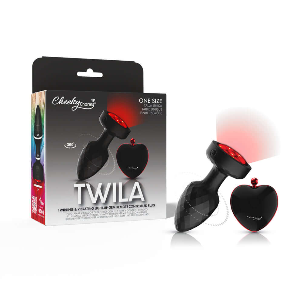Twila Twirling Light Up Vibrating Plug With Heart Remote packaging and product on display with remote control.