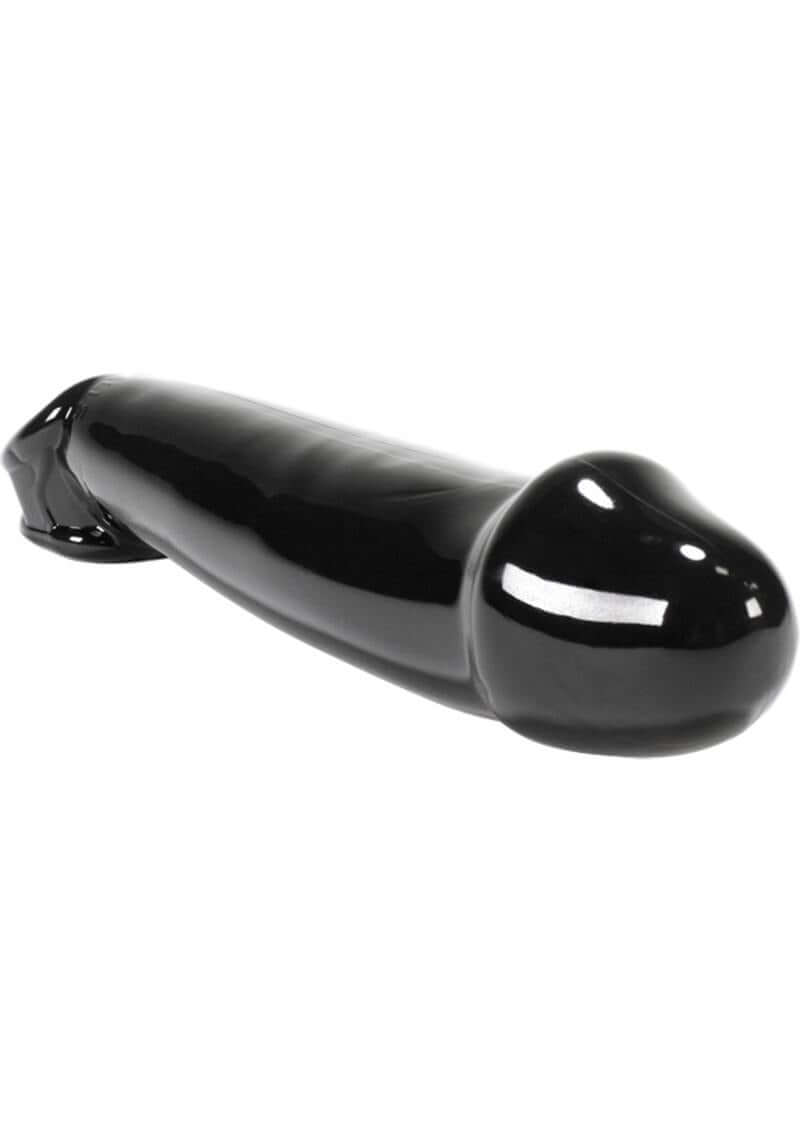 Oxballs Muscle Textured Cock Sheath Penis Extender Black displayed on a white background, highlighting its sleek design.