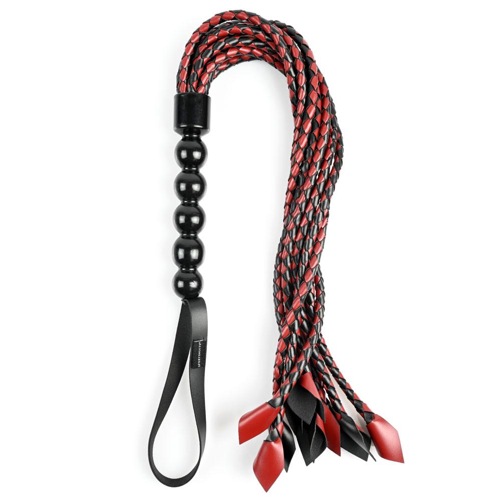 Saffron Braided Flogger with black and red braided falls and a sturdy handle for precise sensation.
