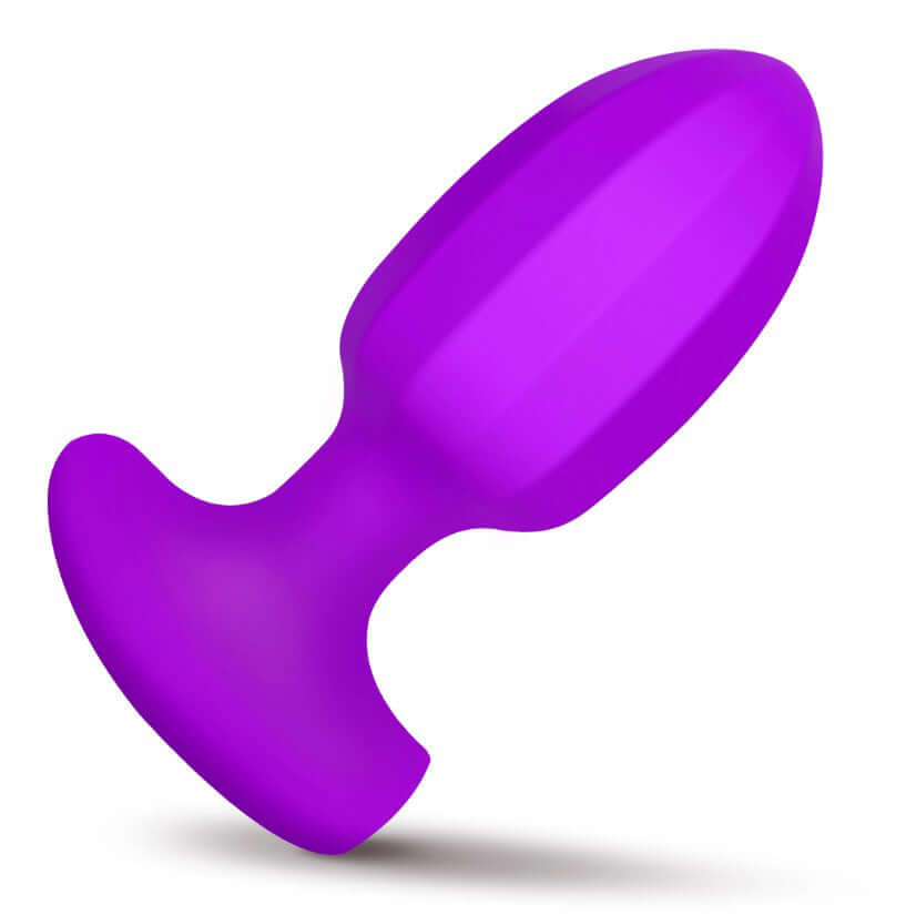 Bang Ribbed Vibrating Silicone Butt Plug Purple shown from the side, highlighting its ribbed design and vibrant color.