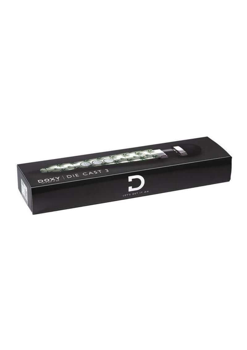 Doxy Die Cast 3 Wand Plug-In Wand Massager Cannabis Pattern packaging in a stylish box.