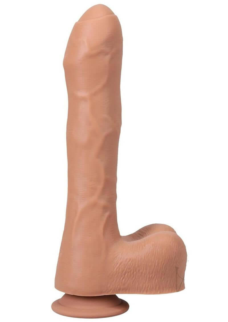 Fort Troff Uncut Thruster Mini Fuck Machine Dildo Tan standing upright on a base, showcasing its lifelike design.