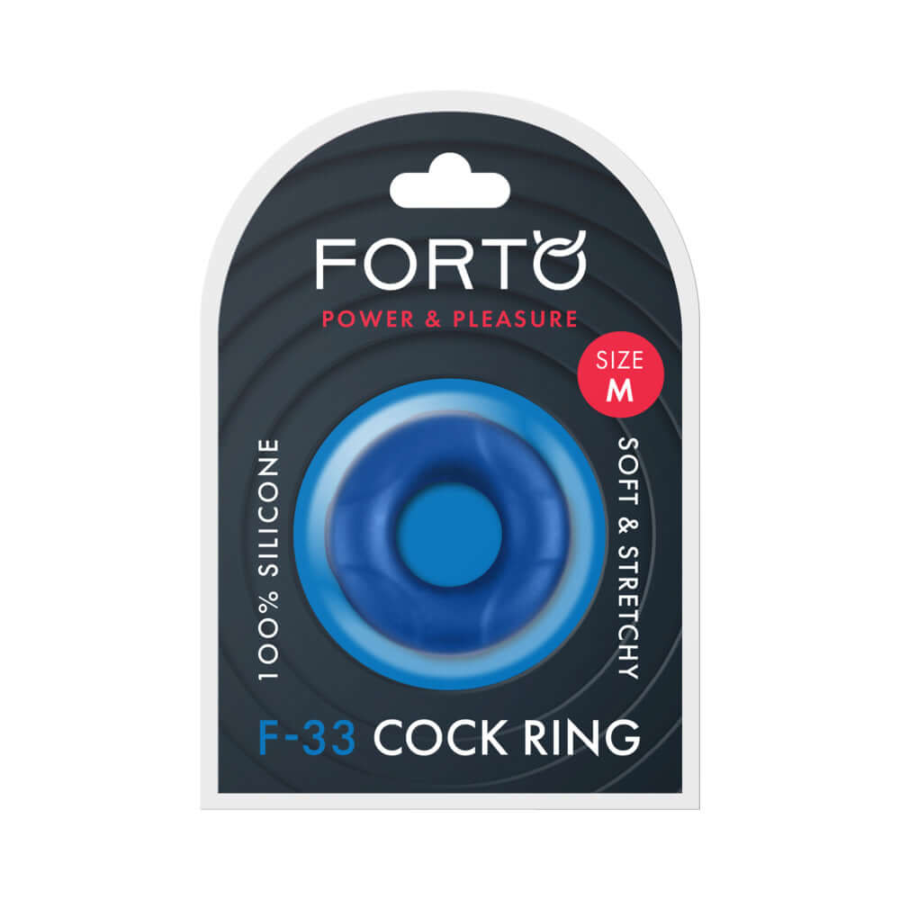 Forto F-33 Liquid Silicone Cockring Medium Blue packaging featuring soft and stretchy design with 100% silicone material.