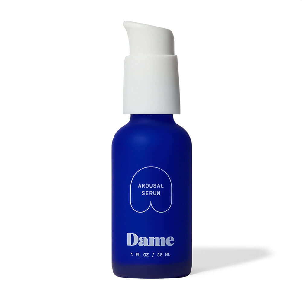 Dame Arousal Serum Peppermint & Cinnamon 1 Oz displayed in a blue bottle with white pump.