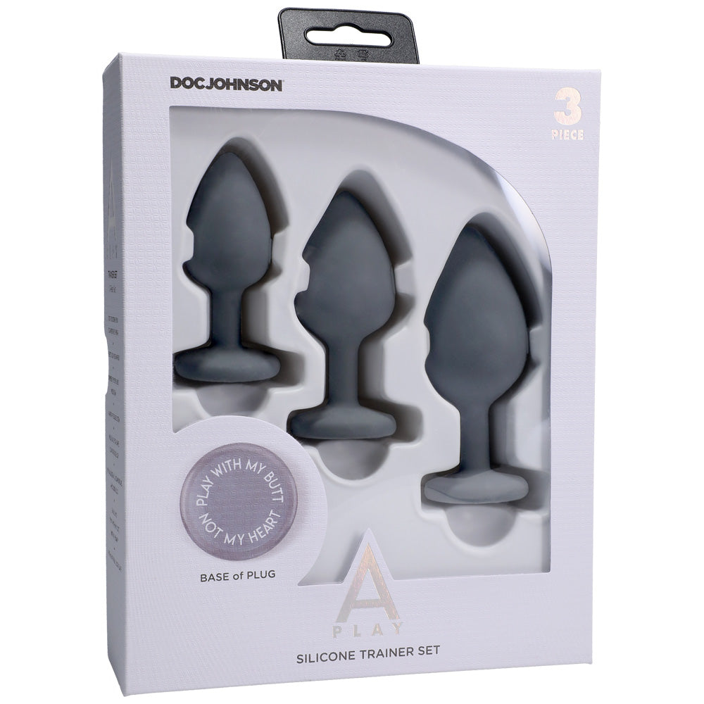 A-Play Silicone Anal Trainer Set 3 Piece Grey packaging featuring three spade-shaped butt plugs for gradual anal play.