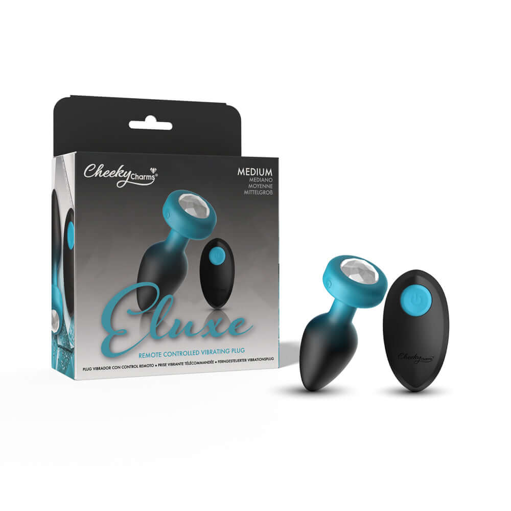 Cheeky Charms Eluxe Vibrating Anal Plug Medium in packaging with remote control, showcasing luxury and pleasure.
