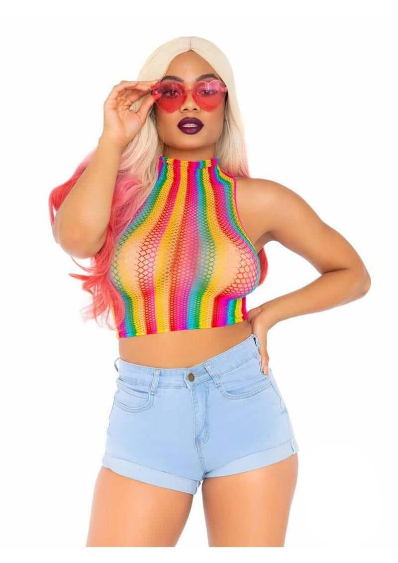 Model wearing Leg Avenue Rainbow Net High Neck Crop Top OS with sunglasses and denim shorts.