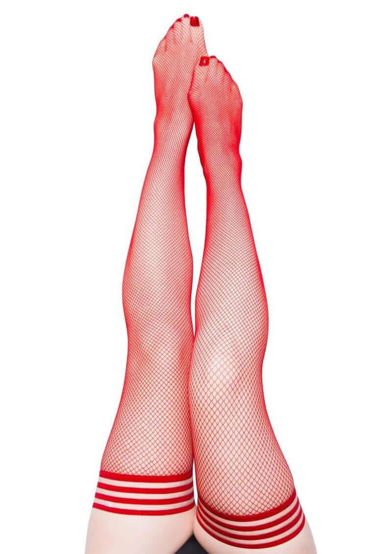 Kixies Sandra Fishnet Thigh High Size B Medium Red showcased on legs, featuring bold fishnet design and vibrant red color.