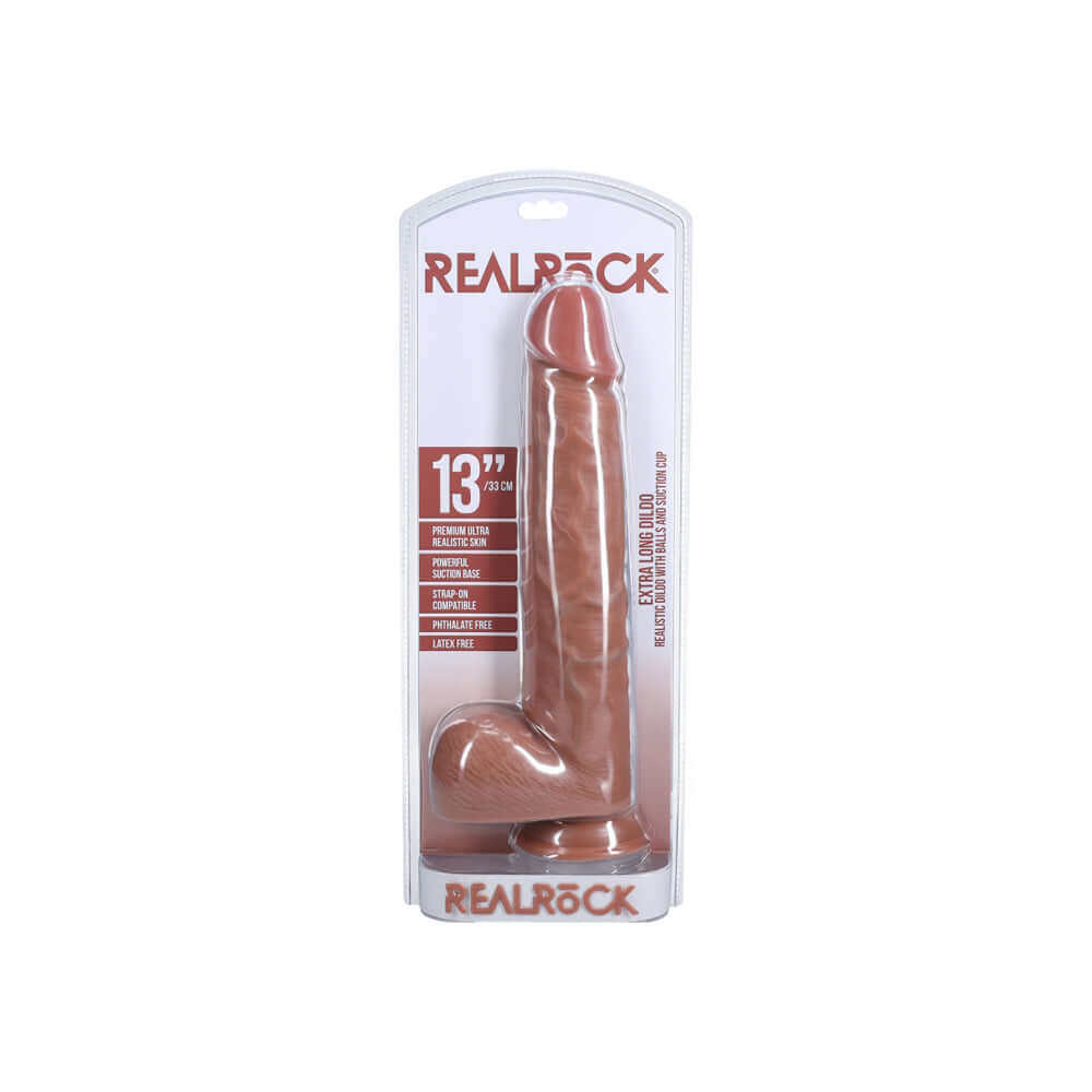 Realrock Extra Long Realistic Dildo With Balls 13 inch Tan in packaging on white background