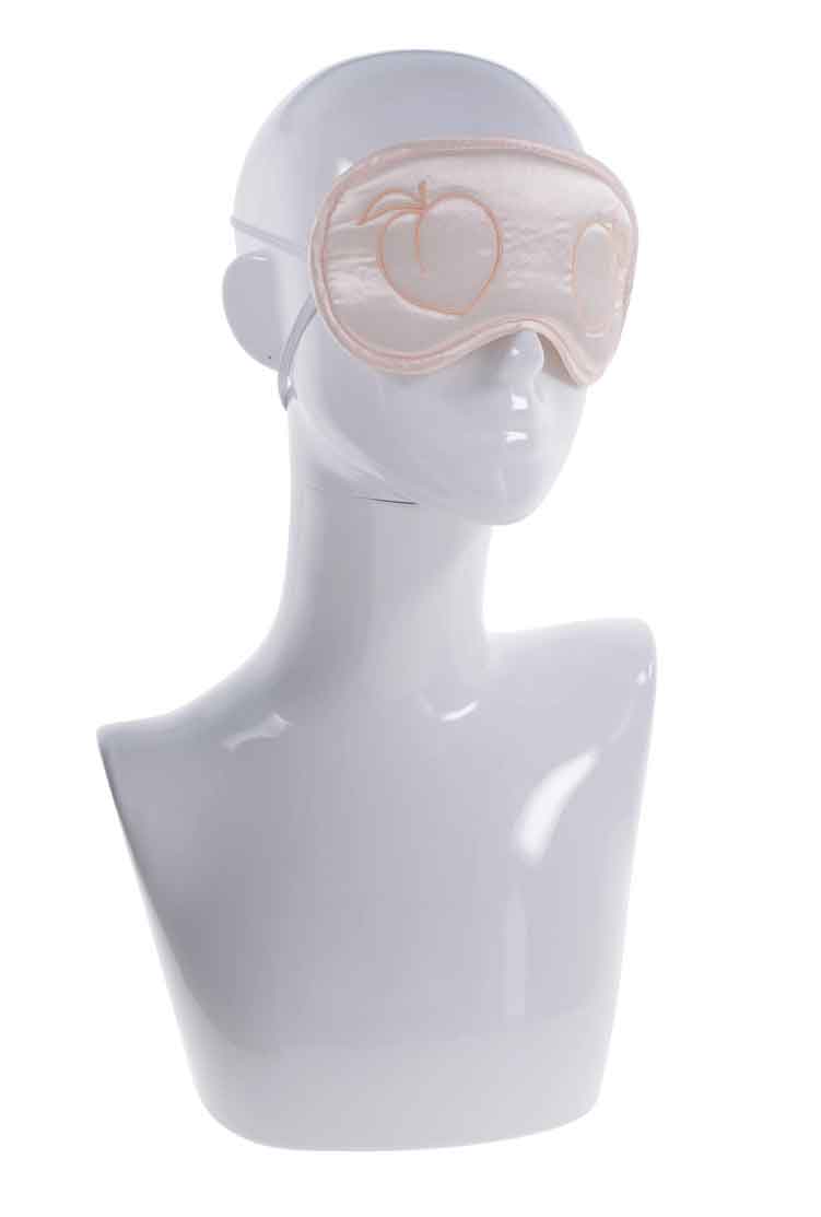 Pink Peaches ‘N Creame Blindfold with peach design displayed on a mannequin head