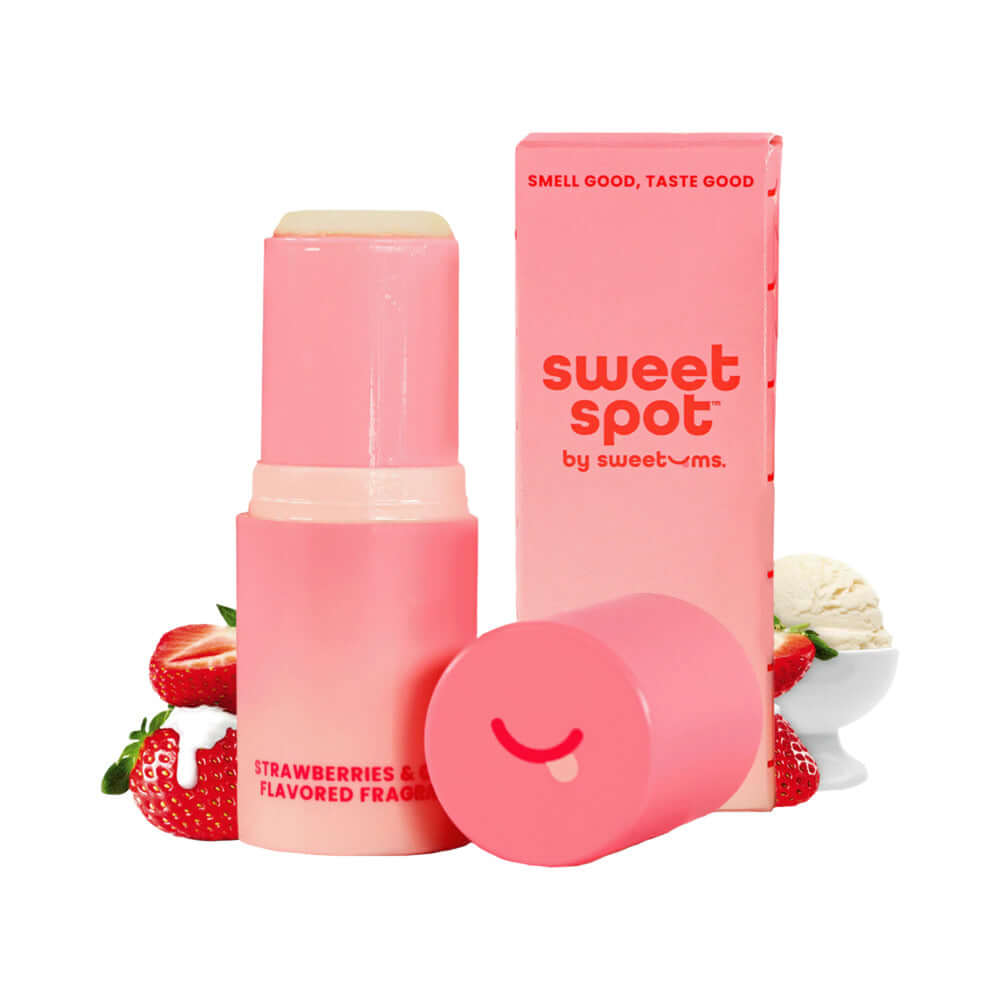 Sweetums Sweet Spot Flavored Fragrance Strawberries & Cream product with packaging and strawberries in the background.
