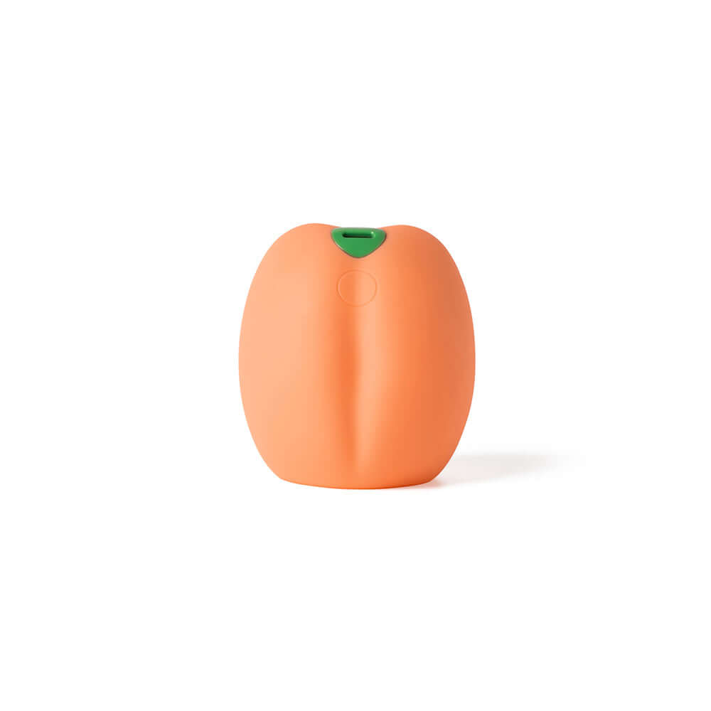 Emojibator Peach Vibrating Stroker in a compact, peach-inspired design with a soft texture and rechargeable feature.
