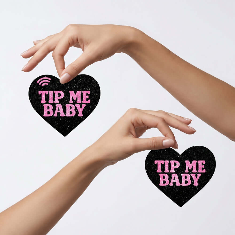 Neva Nude Pink Tip Me Baby Heart Smart NFC Pasties with hands holding heart-shaped designs.