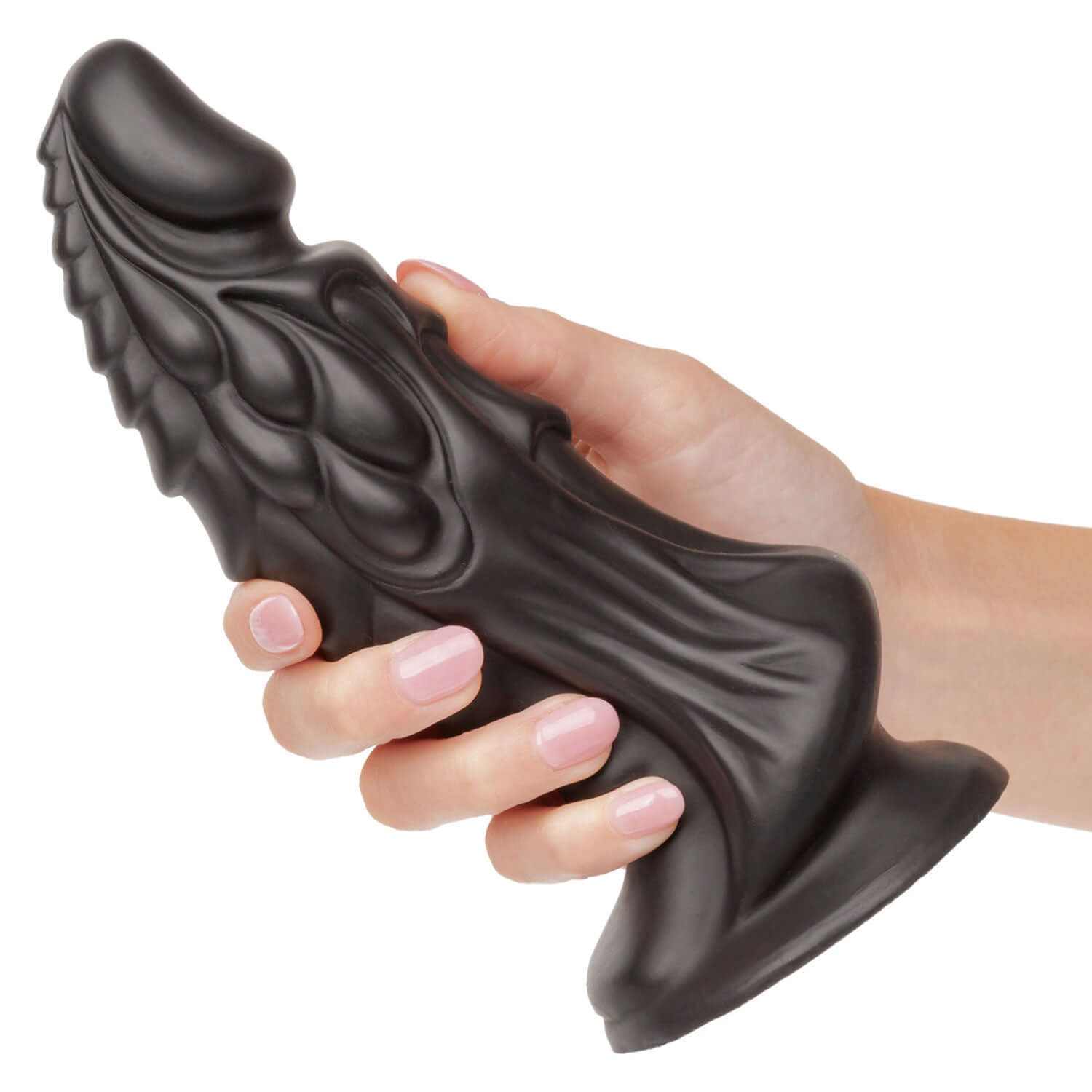 Hand holding Monster Dong The Martian 7.75 inch black Liquid Silicone toy with firm, life-like design for exhilarating pleasure.