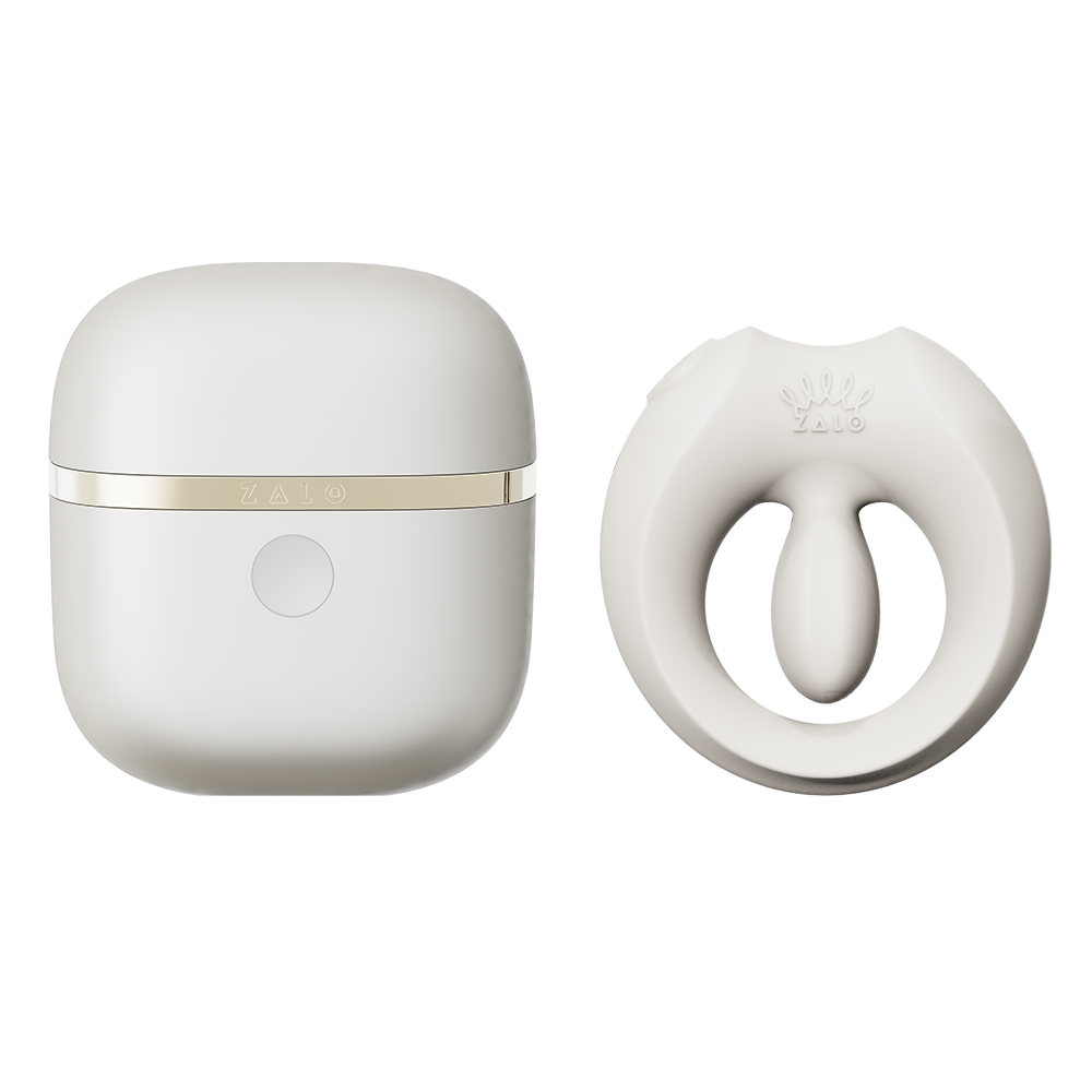 ZALO Apis Vibrating Couples Ring Ivory White next to its charging case, highlighting premium design and modern features.