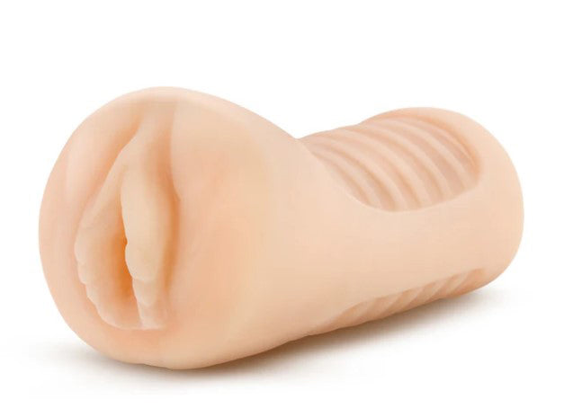 Enlust Georgia Male Masturbator With Bullet Vibrator Beige shown from side angle, featuring ribbed texture and soft material.