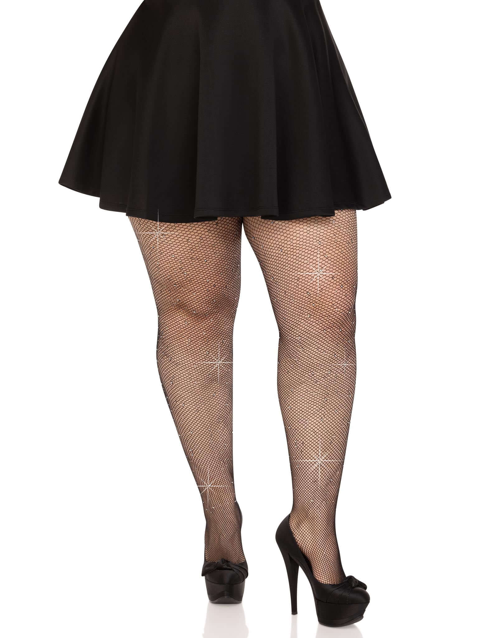 Colby Rhinestone Fishnet Tights 1x/2x in black with sparkling rhinestones, worn with a black skirt and high heels, by Leg Avenue