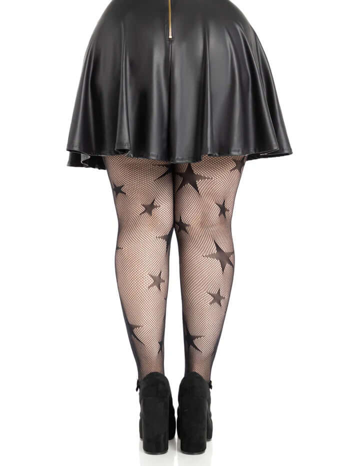 Leg Avenue Star Net Tights 1X 2X Black worn with a black skirt showcasing stylish star net pattern.