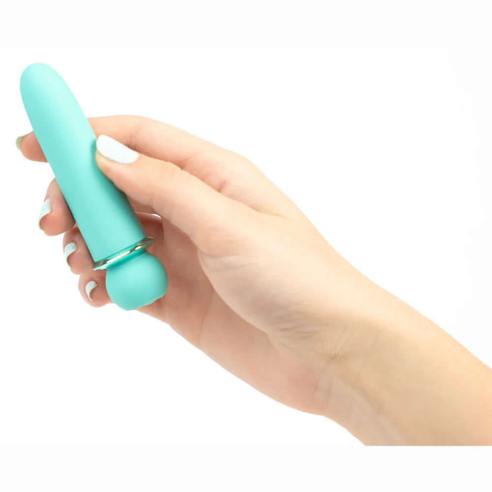 Hand holding the Jaguar Fiercely Powerful blue vibrator with 10-function design by Maia Novelties.