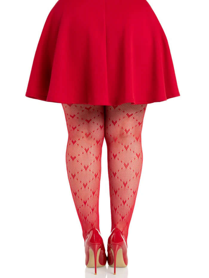 Leg Avenue Plus Size Valentina Heart Net Tights 1X 2X Red worn under a flared red skirt with high heels.