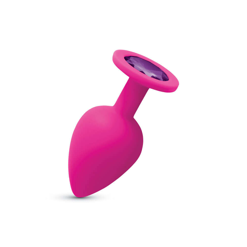 Gemma Purple Gem Pink Silicone Plug Large, a bold and body-safe anal plug with a decorative purple gem.