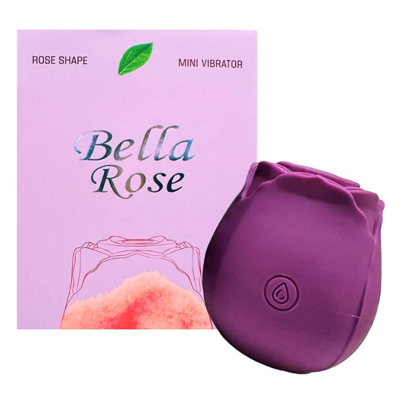 Bella Rose Purple Silicone Clitoral Vibrator in rose shape packaging with pink background.