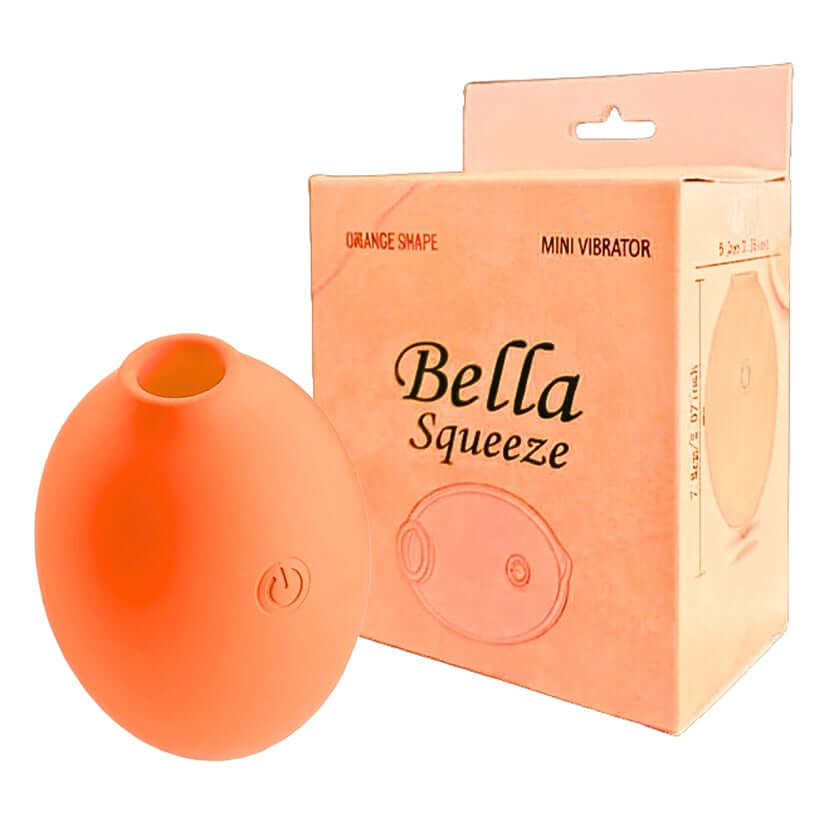 Bella Squeeze Orange Shaped Mini Vibrator displayed alongside its box, showcasing playful design and compact size.