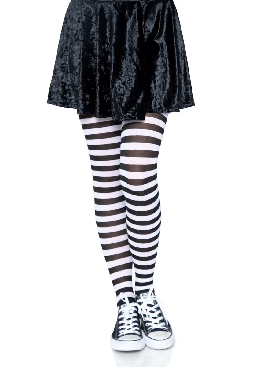Leg Avenue Nylon Striped Tights Black White OS styled with a black skirt and sneakers.