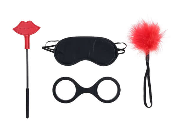 Ex's and Oh's Kiss Kit featuring a blindfold, feather tickler, and playful lip crop for intimate fun.