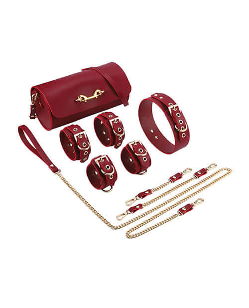 Kinky Play Box Federico Luxurious Leather Restraint Kit Red accessories including leather cuffs, a collar, and a stylish storage pouch.