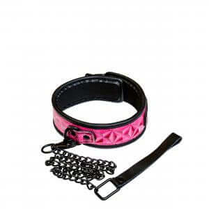 Sinful Collar Pink NS Novelties featuring bold pink vinyl and chain accents for stylish adventurous play.