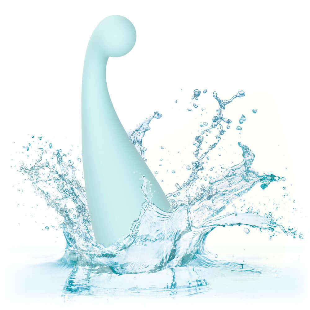 Slay Thrill Me Clitoral Massager splashing in water, showcasing its sleek design for pinpoint stimulation.