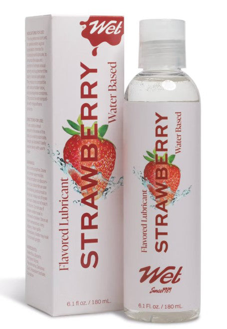 Wet Flavored Lubricant Sexy Strawberry 3.1 Oz bottle with packaging highlighting water-based formula and strawberry flavor.