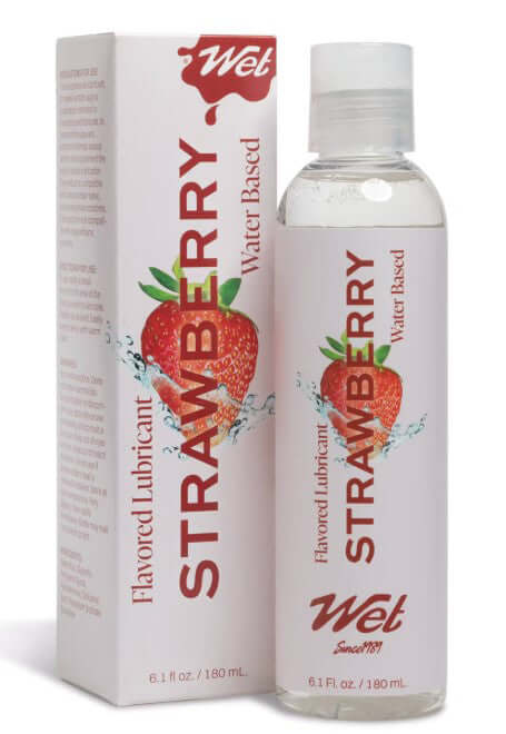 Wet Flavored Lubricant Sexy Strawberry 3.1 Oz bottle with packaging highlighting water-based formula and strawberry flavor.