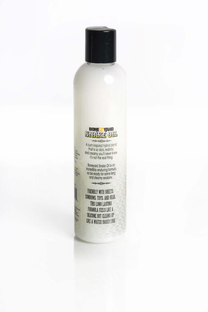 Boneyard Snake Oil Cum Lube 8.8oz bottle, hybrid blend lubricant for long-lasting, steamy sessions, friendly with sheets, condoms, and toys.