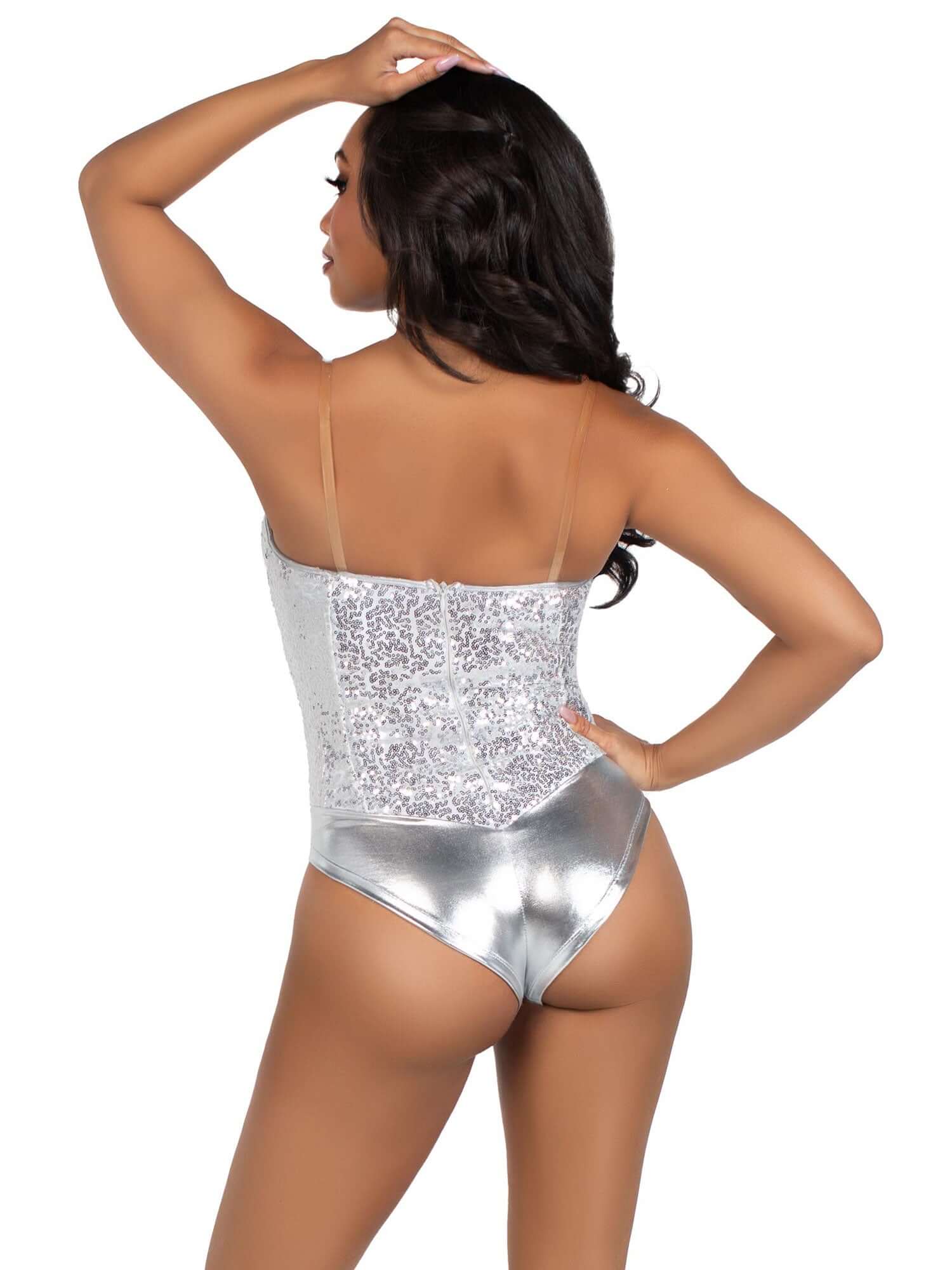 Woman wearing silver 2 Pc sequin bodysuit with detachable clear straps, featuring a snap crotch and boned structure, viewed from the back.