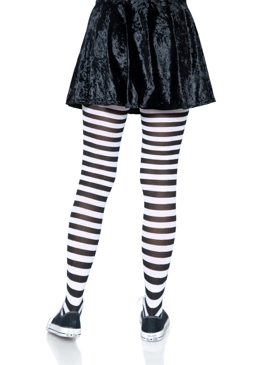 Leg Avenue Nylon Striped Tights Black White OS worn with a black skirt, showcasing bold black and white stripes.