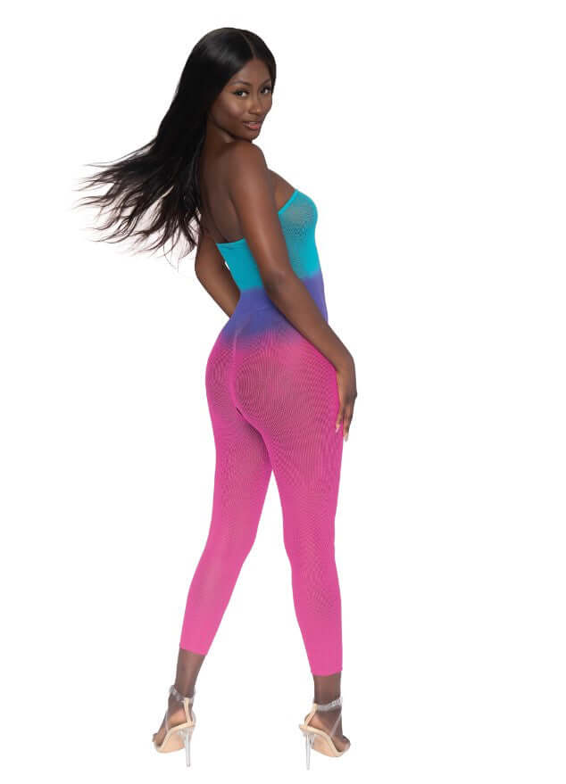 Model showcasing the Dreamgirl Seamless Mesh Bodystocking OS Neon Rainbow in vibrant colors from back view.