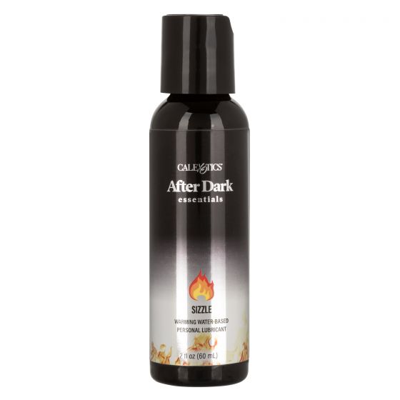 After Dark Sizzle Warming Water Based Lube 2 Oz bottle with a fiery design for enhanced intimacy.