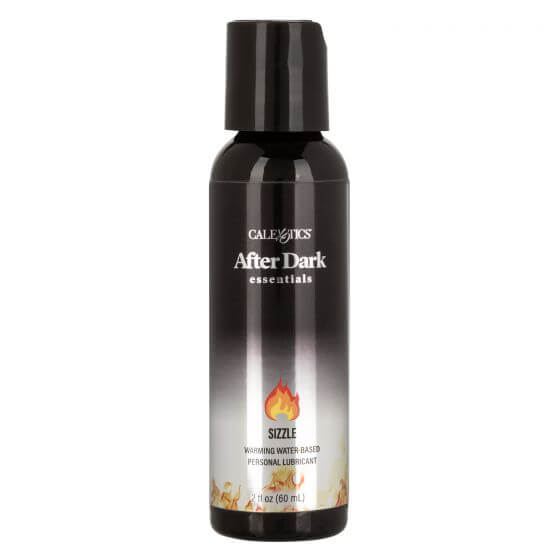 After Dark Sizzle Warming Water Based Lube 2 Oz bottle with a fiery design for enhanced intimacy.