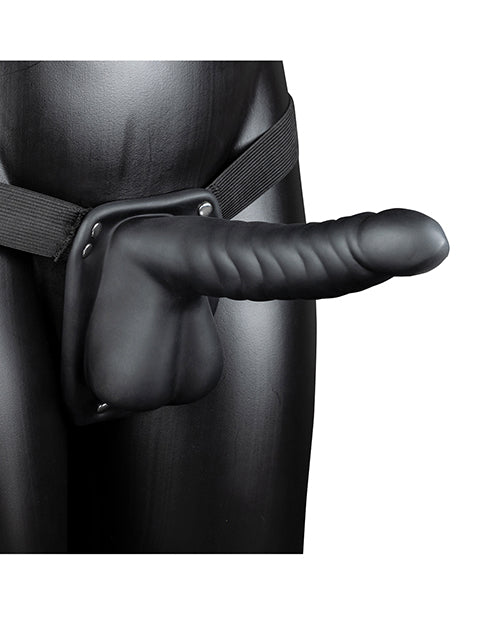 Ouch 8 inch Ribbed Hollow Strap On with Balls Black displayed on a mannequin with adjustable harness system.