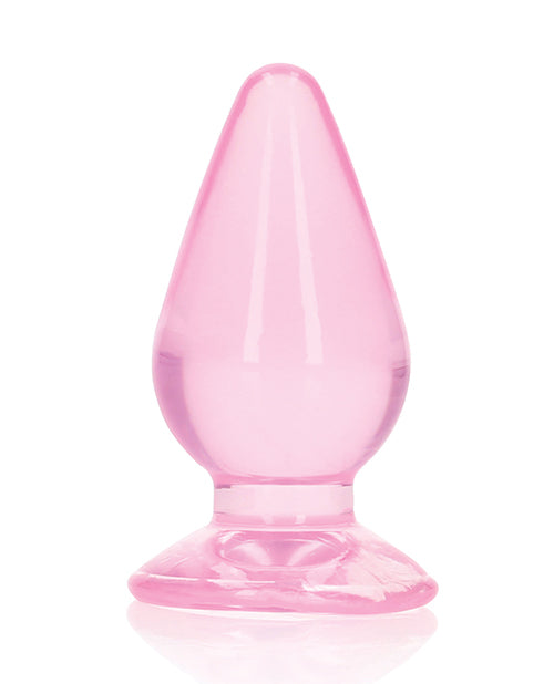 RealRock Crystal Clear 3.5 inch Anal Plug Pink displayed on a white background showcasing its sleek design and pink color.