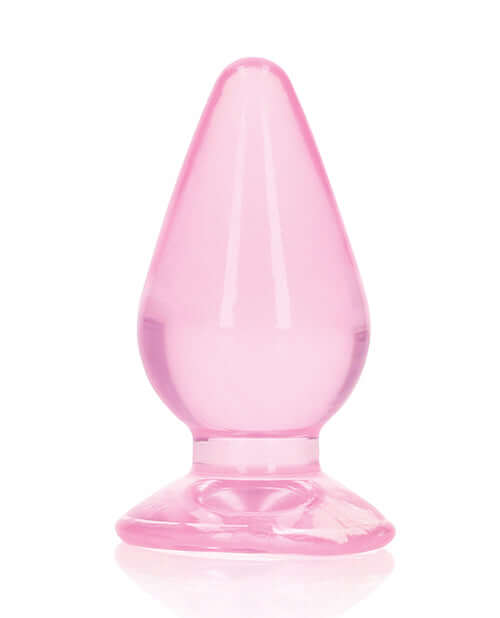 RealRock Crystal Clear 3.5 inch Anal Plug Pink displayed on a white background showcasing its sleek design and pink color.