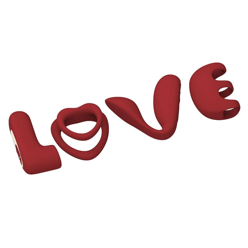 Tracys Dog Love Vibrators Kit featuring playful red silicone shapes spelling love.