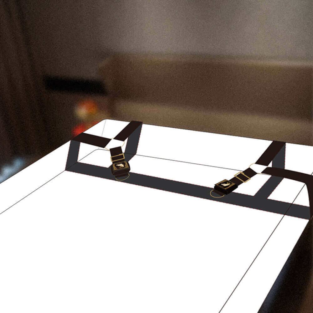Adjustable bed restraint strap in black and gold on a white surface, ideal for enhancing comfort and safety in BDSM play.