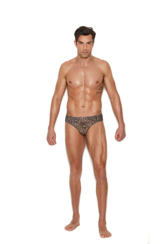 Mens Thong Back Brief Small Medium Animal worn by a model showcasing bold leopard print design.