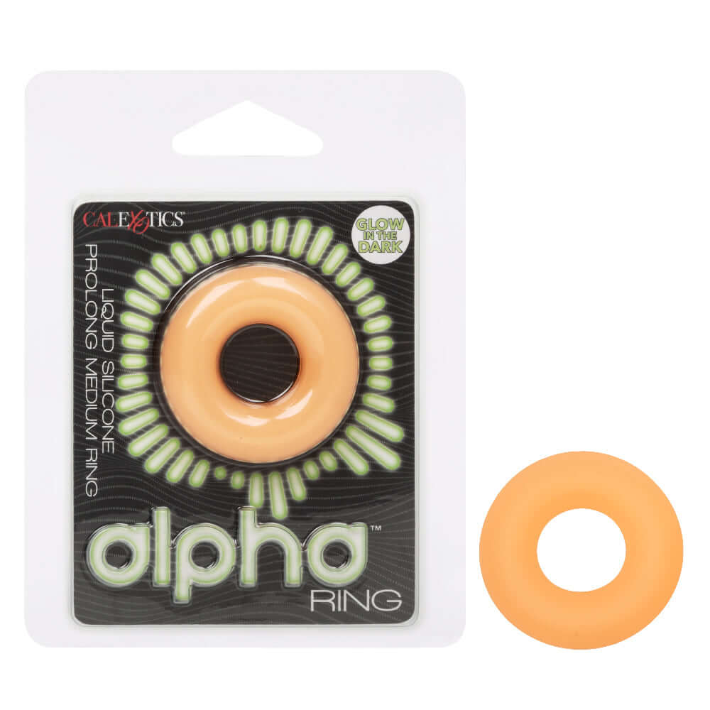 Alpha Glow-in-the-Dark Liquid Silicone Medium Ring Orange packaging and product image with a playful design.